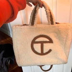Unisex TELFAR Bag made in collaboration with UGG in sheepskin with a suede trim.
